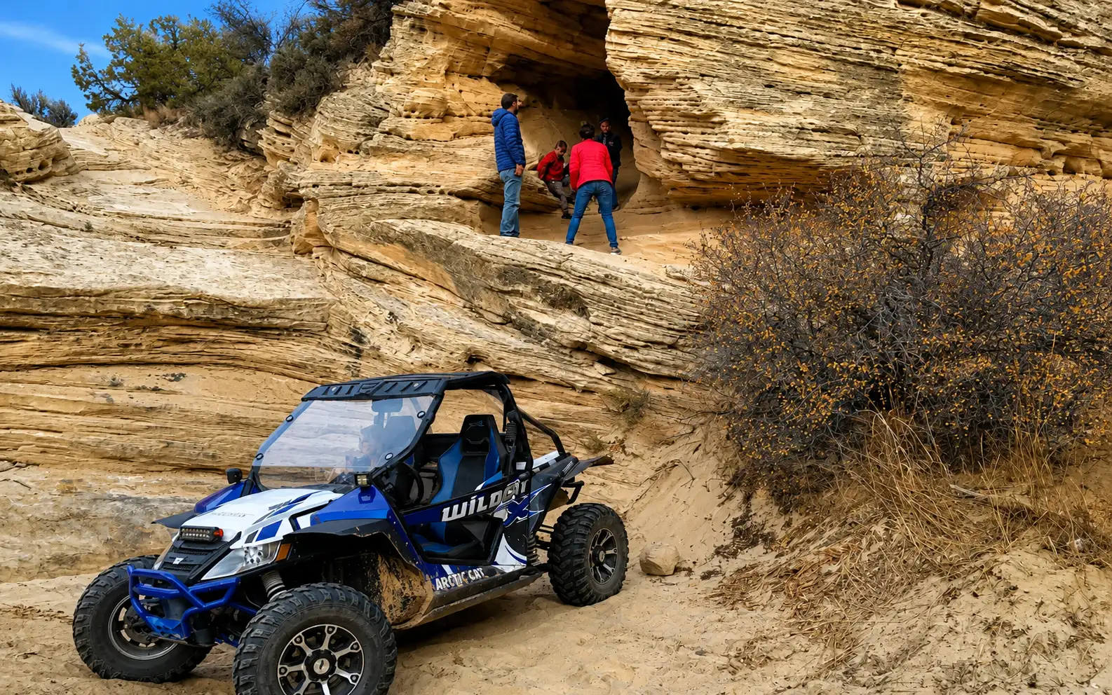 Side-by-side UTV parked in a sandstone alcove on an Adventure Tours Vernal UTV tour
