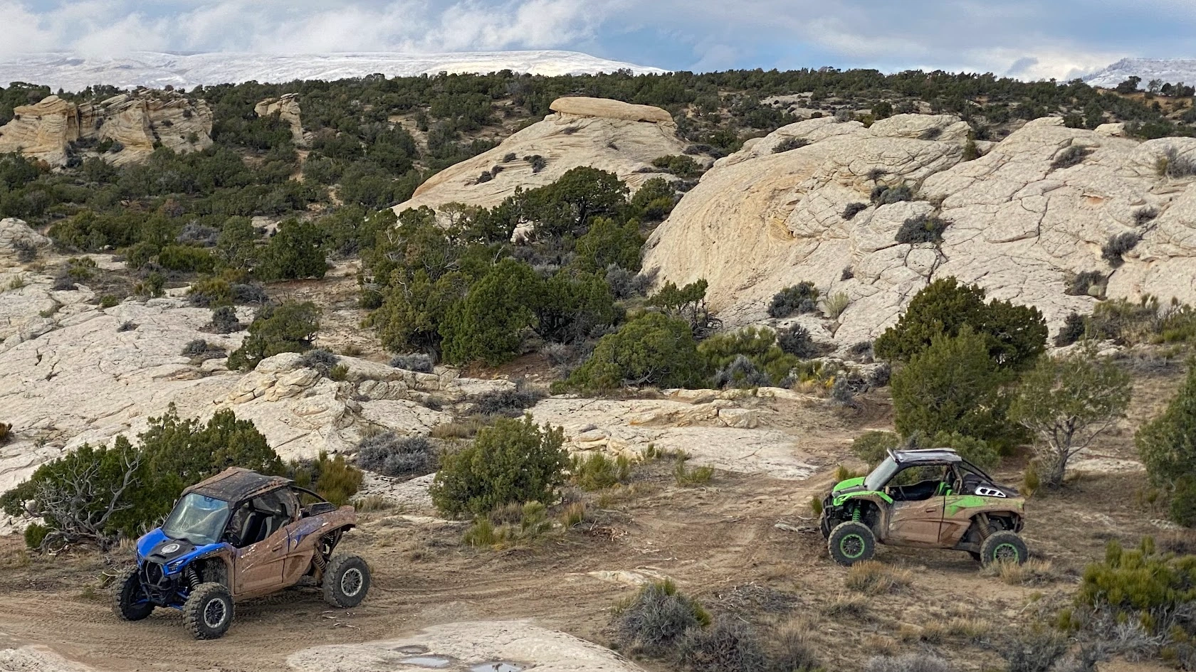 Side-by-side UTVs in the high desert on a backcountry tour near Vernal Utah