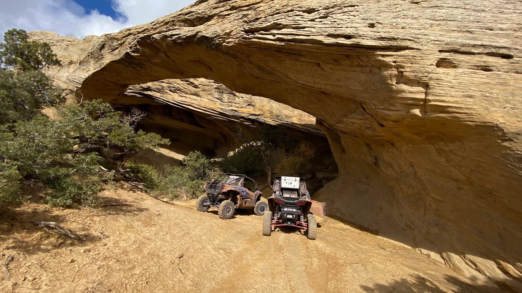 View through a rock arch toward a desert butte near Vernal Utah