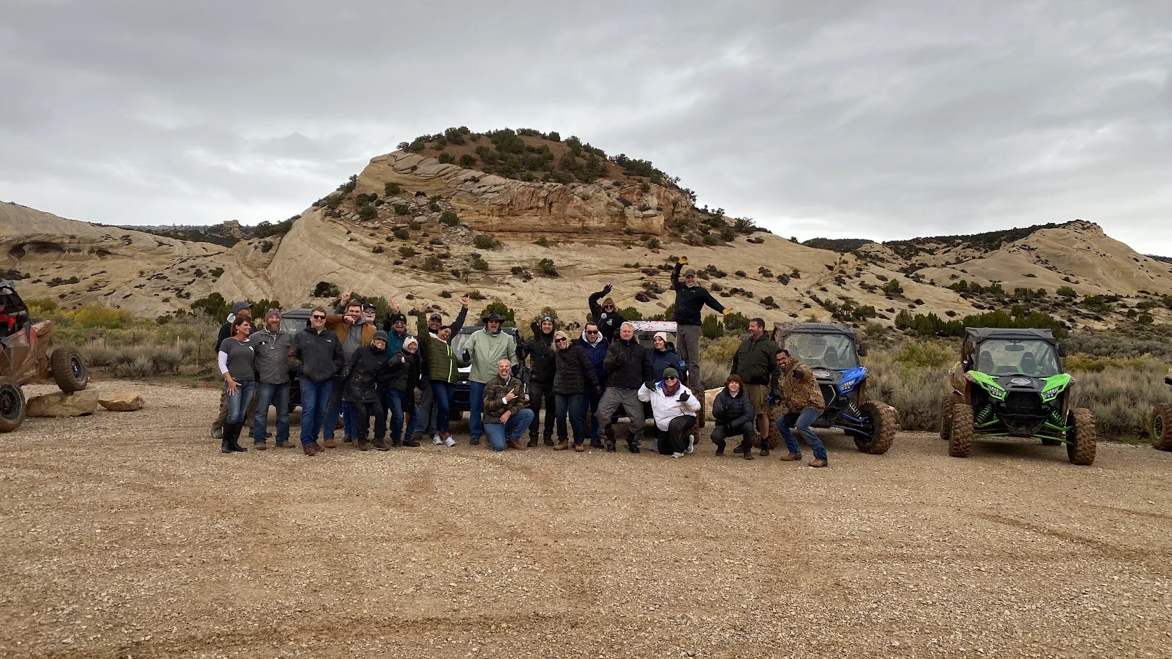 Tour group with Kawasaki KRX 1000 side-by-sides on a ridge near Vernal Utah