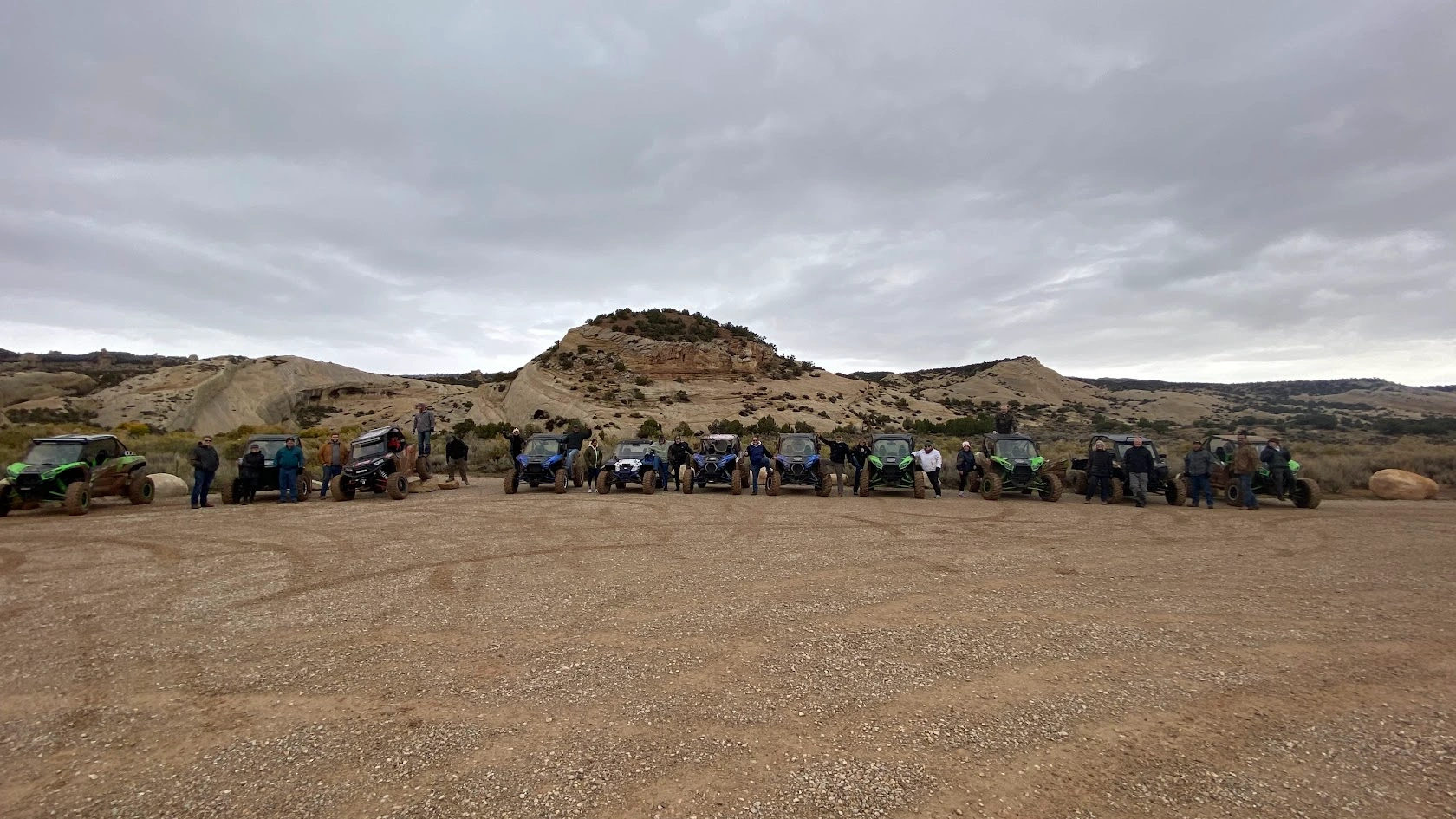 Fleet of side-by-side UTVs staged on a hilltop near Vernal Utah