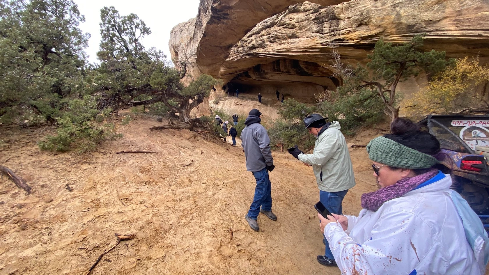 Riders exploring cliff dwellings on an Adventure Tours Vernal UTV tour