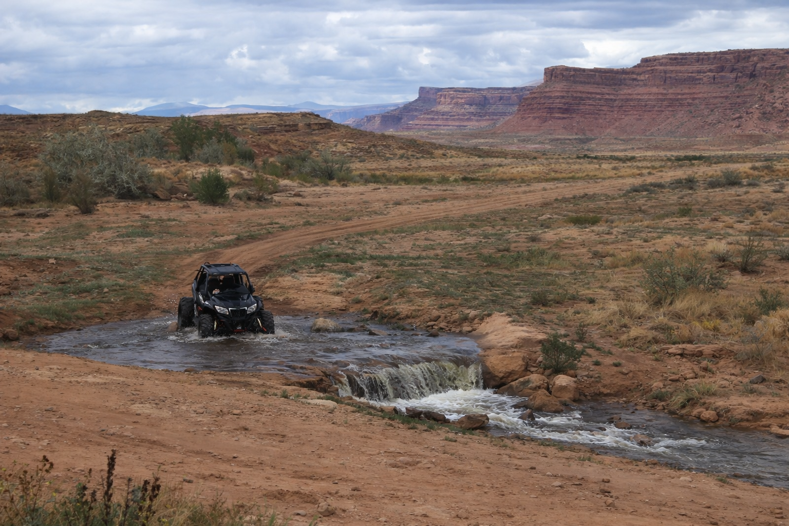 Side-by-side UTV on a river crossing adventure near Vernal Utah