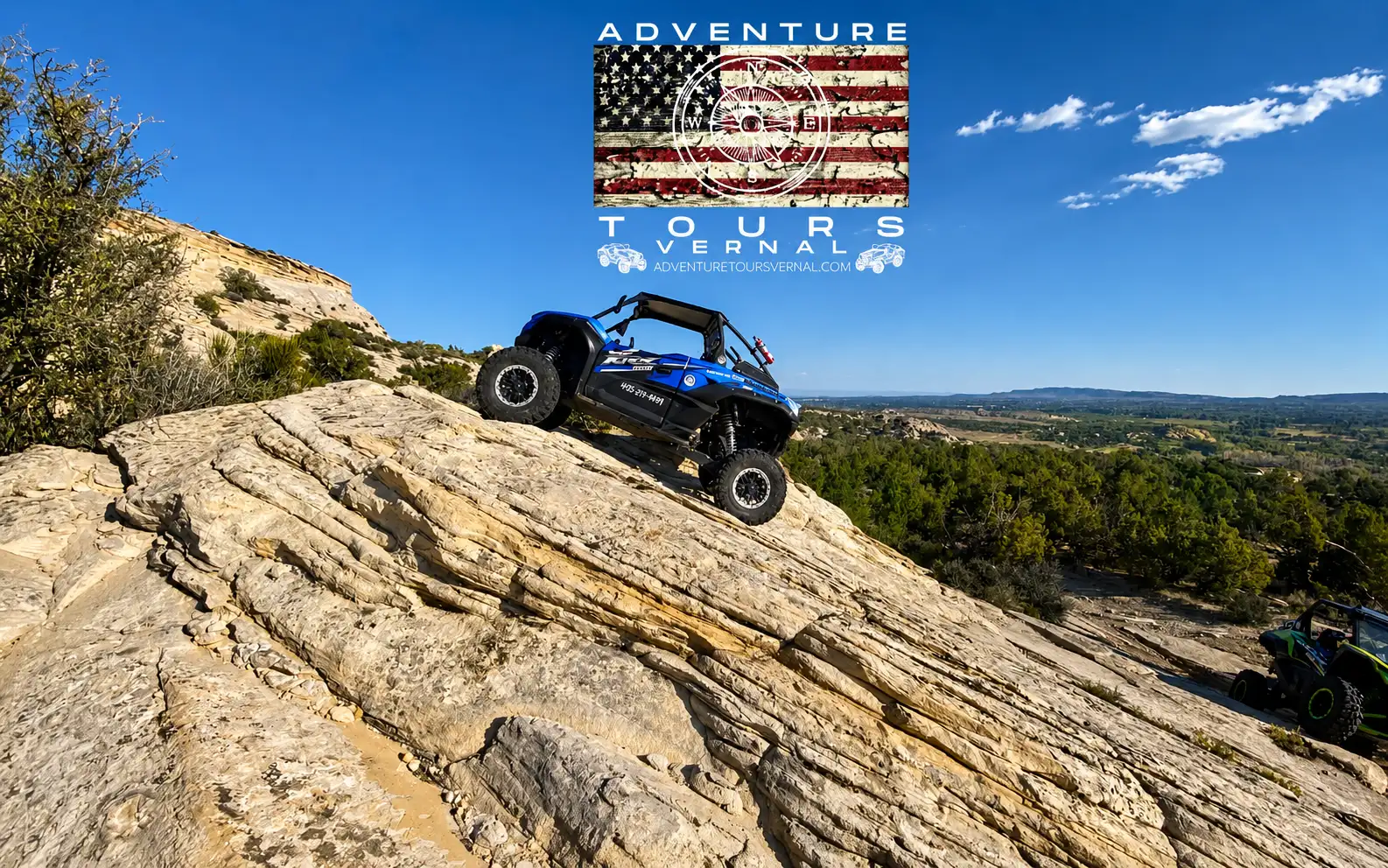 Side-by-side UTV on a slickrock summit climb near Vernal Utah