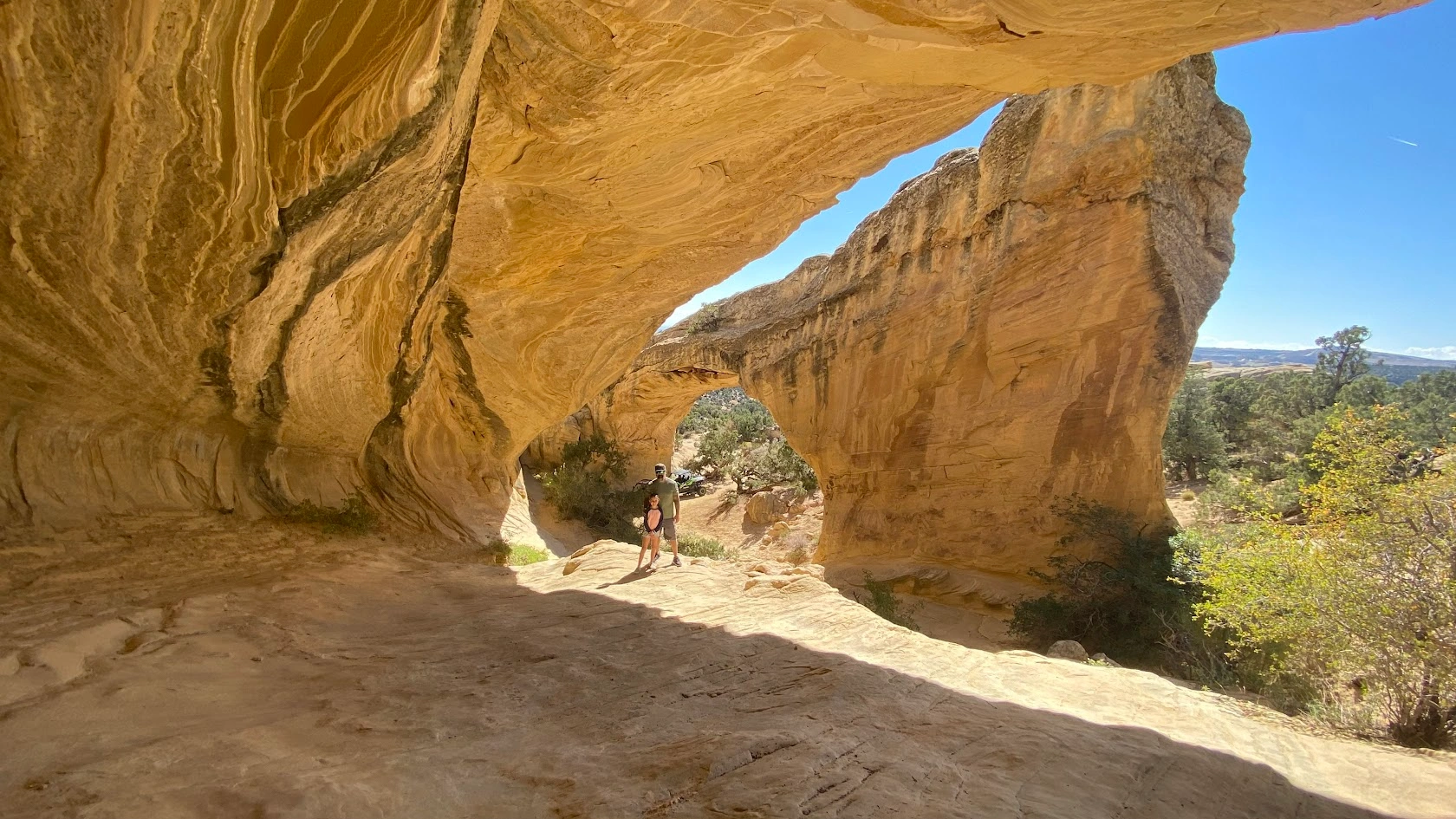 Golden sandstone arch on a backcountry UTV tour near Vernal Utah