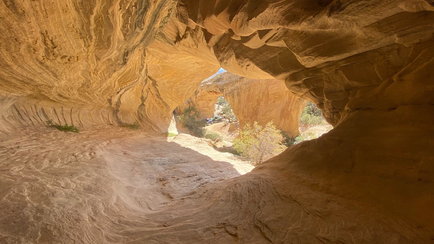 Interior of a sandstone cave on an Adventure Tours Vernal tour near Vernal Utah